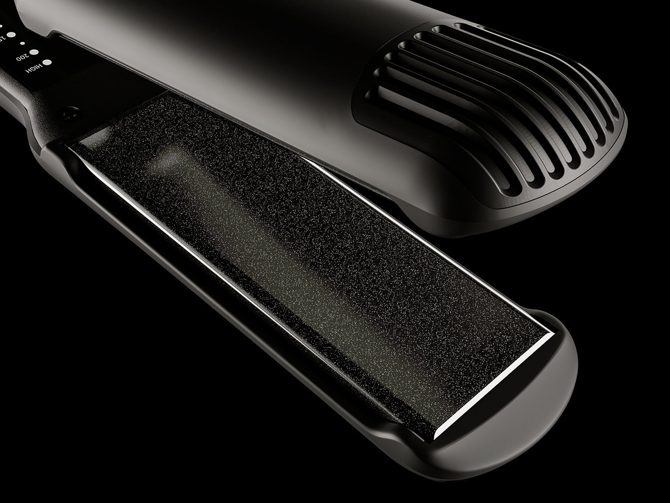 Close-up image of the plates on the black CLOUD NINE Wide Iron on a black background.